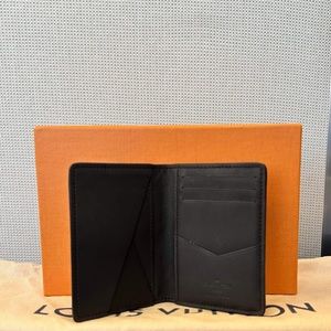 Authentic Louis Vuitton black calfskin rare pocket organizer Pristine!